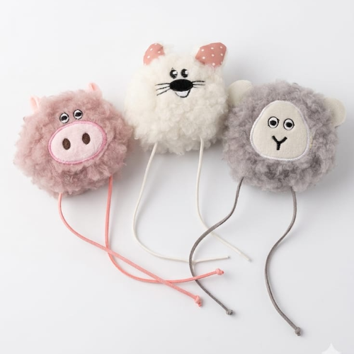 Peluche de animal con cordones
